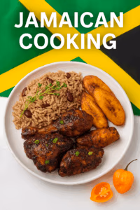 Jamaican flag and plate of Jamaican Food next to scotch bonnet peppers