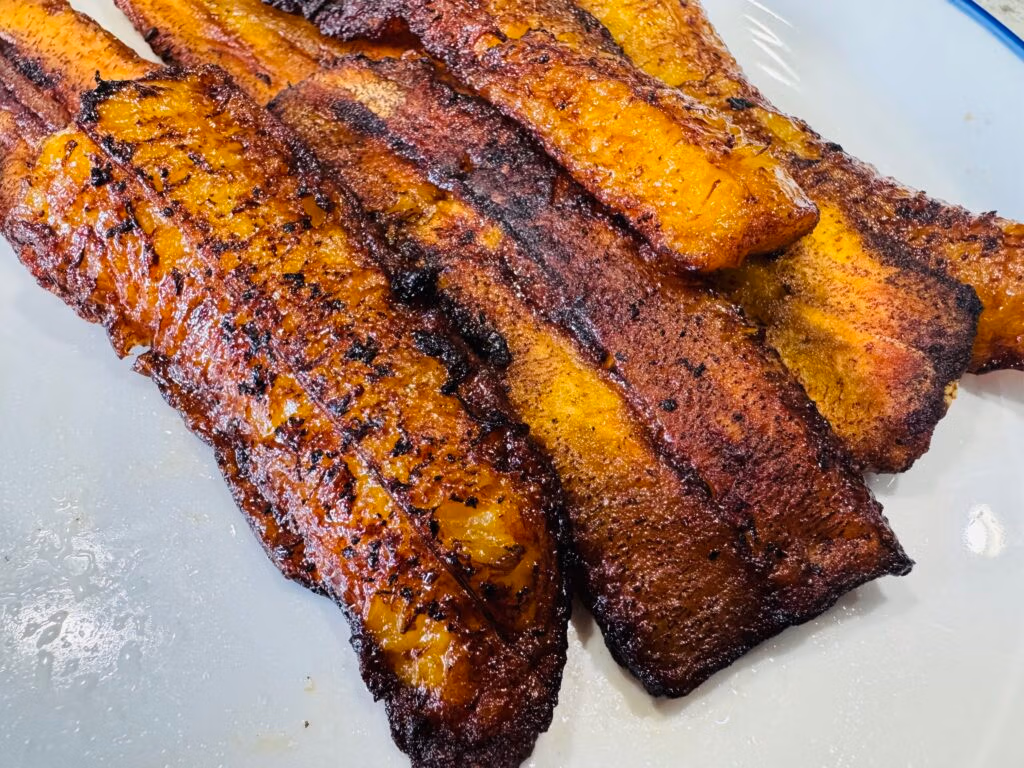 A white Plate of Fried Sweet Plantains