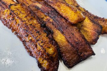 A white Plate of Fried Sweet Plantains