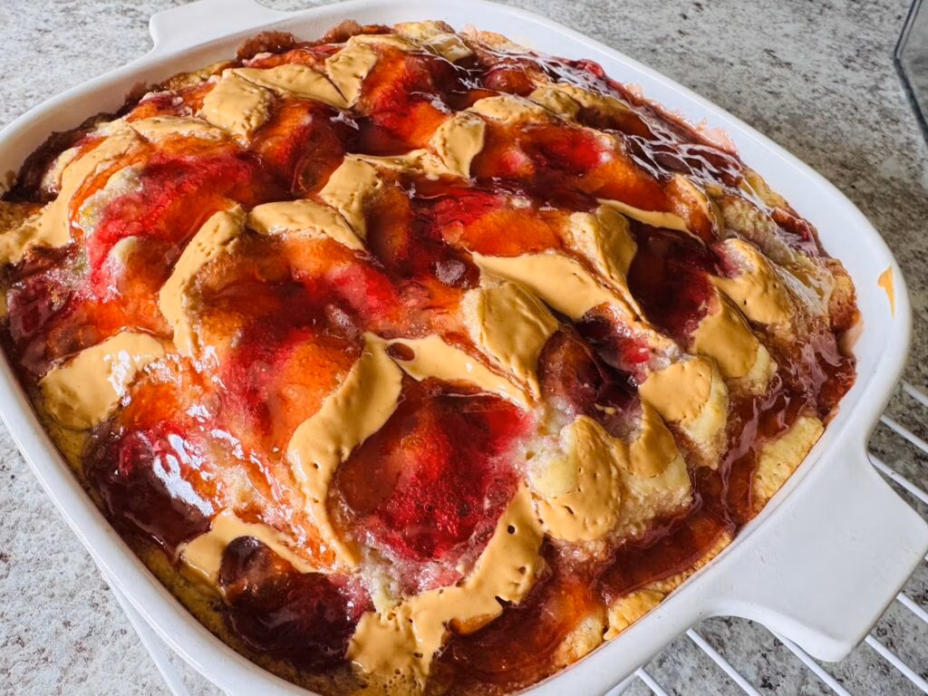 A baked peanut butter and jelly pancake with chevron designs