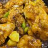 Sweet and Sour Chicken Dinner with pineapple and Chopped Green Peppers