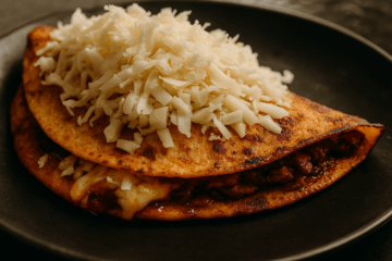 SLow cooker beef birria taco with oaxaca cheese