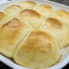 golden homemade dinner rolls fresh from the oven
