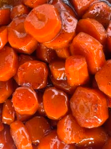 Closeup of glossy carmelized southern candied carrots