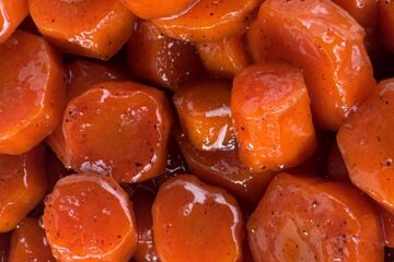 Closeup of glossy carmelized southern candied carrots