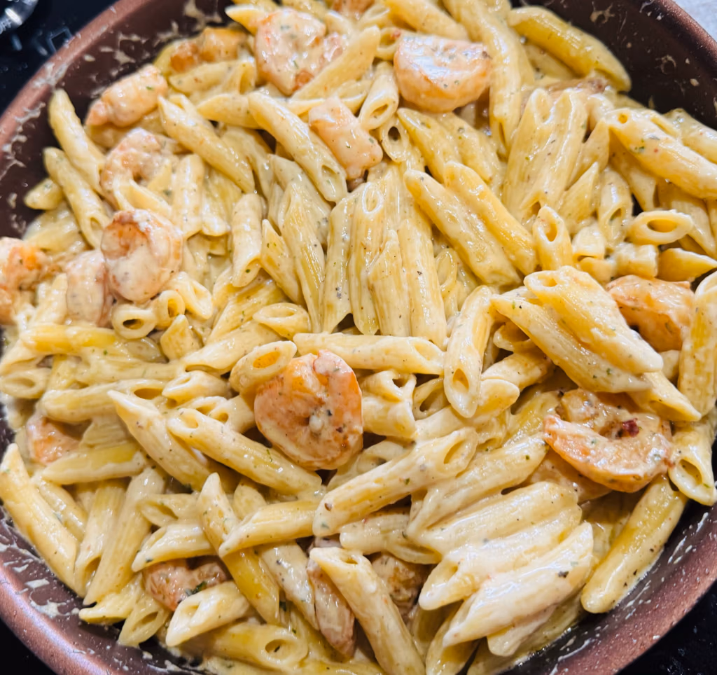 homemade shrimp alfredo with juicy shrimp and saucy penne pasta