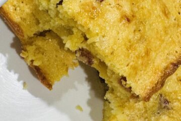 maple bacon cornbread on a white plate