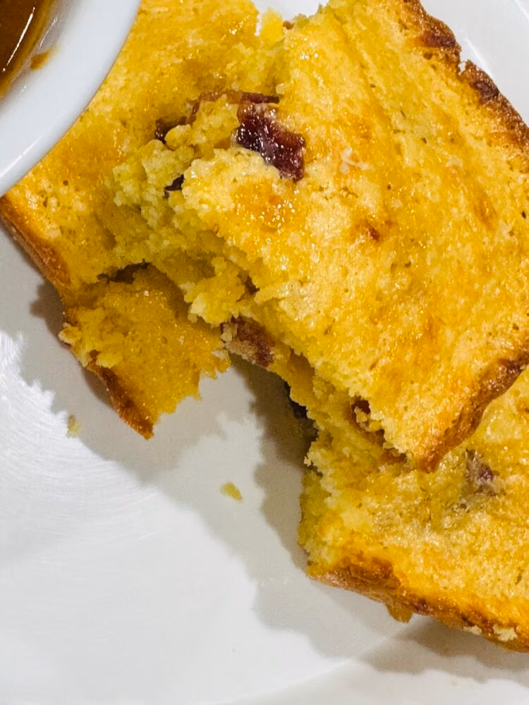 maple bacon cornbread on a white plate