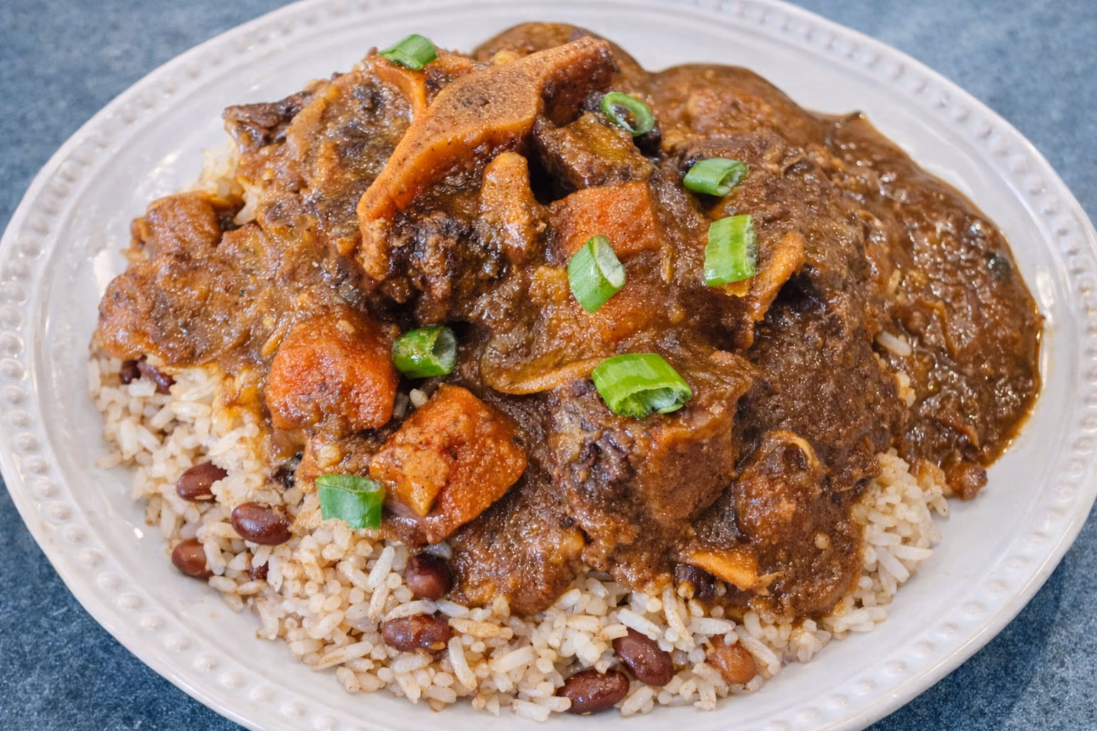 How To Make Slow Cooker Jamaican Oxtails With Butter Beans